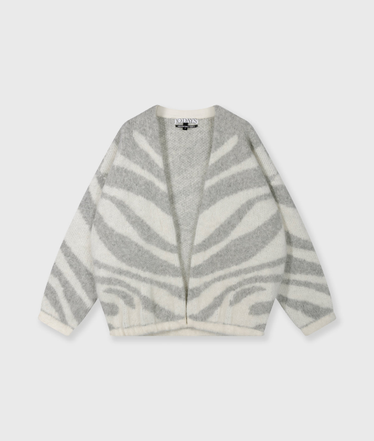 knit cardigan zebra ecru | Bildmaterial bereitgestellt von SHOES.PLEASE.